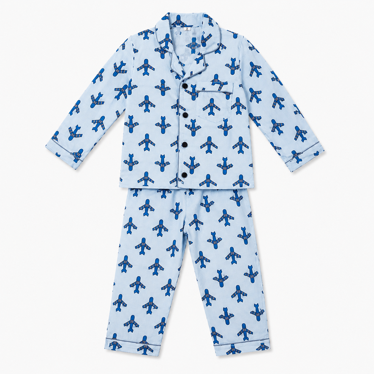 Children's pajama set with airplane pattern on a light blue background