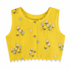Yellow sleeveless top with floral embroidery on a white background