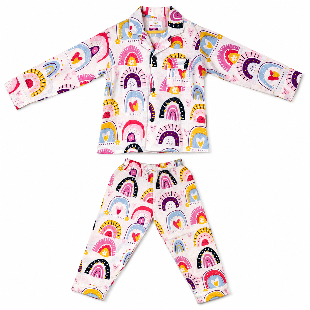 Children's pajama set with colorful rainbow pattern on a white background