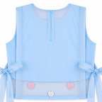 Light blue sleeveless top with heart designs and tied sleeves on a white background