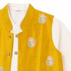 close up shot of mustard yellow koti jacket with ivory kurta