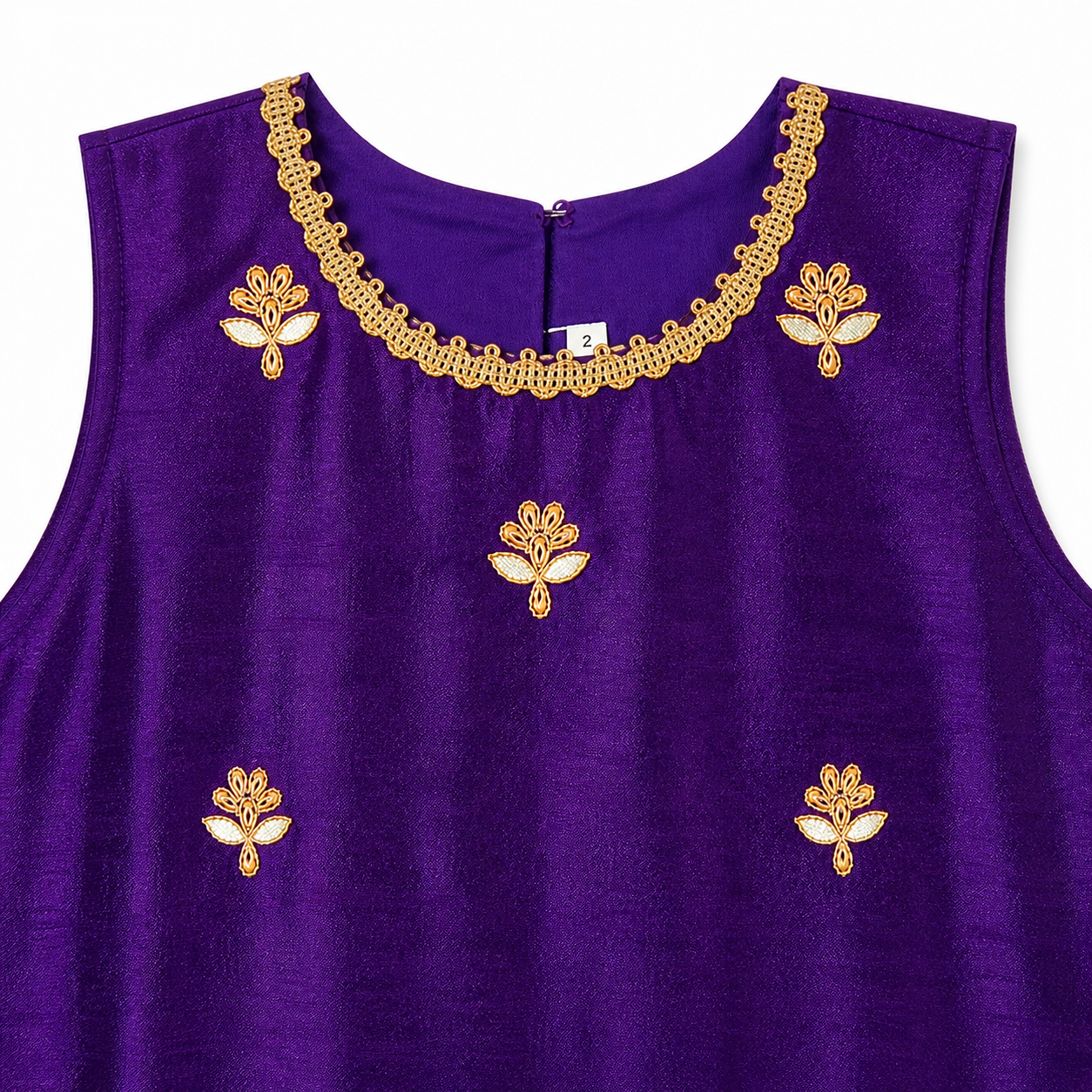Purple sleeveless top with gold embroidery on a white background