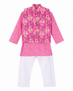 Pink floral and striped top with white pants on a white background