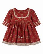 Red floral dress with gold accents on a white background