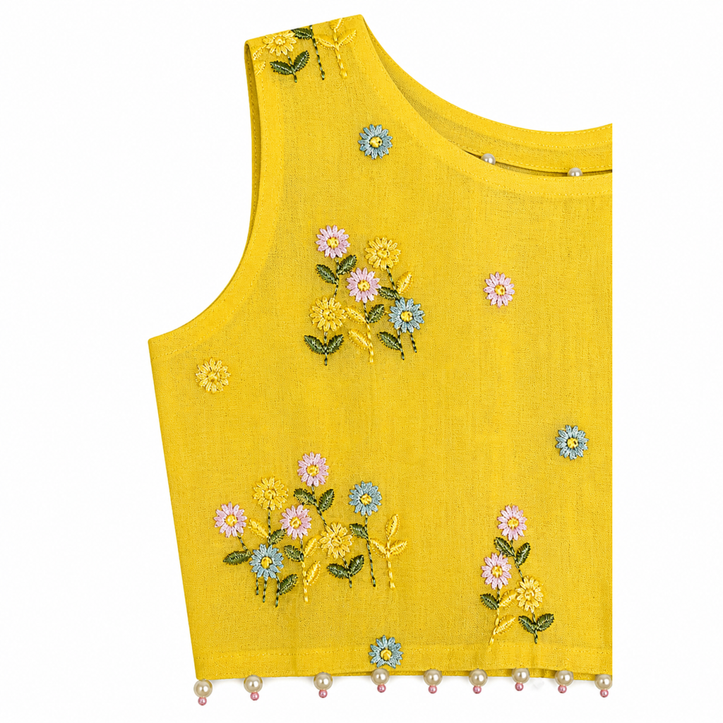 Yellow sleeveless top with floral embroidery on a white background