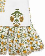 Traditional outfit with floral patterns on a white background