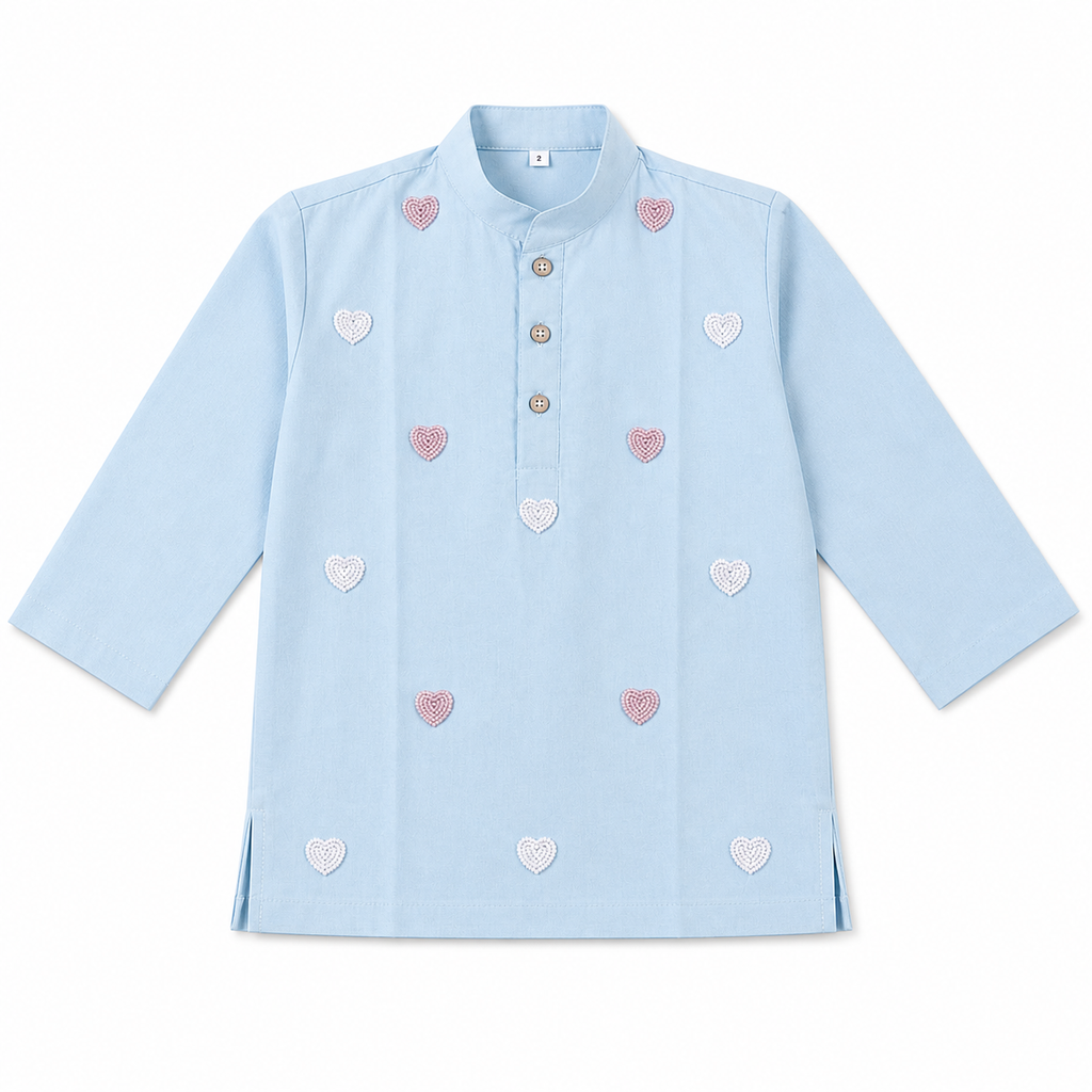 Light blue shirt with heart patterns on a white background