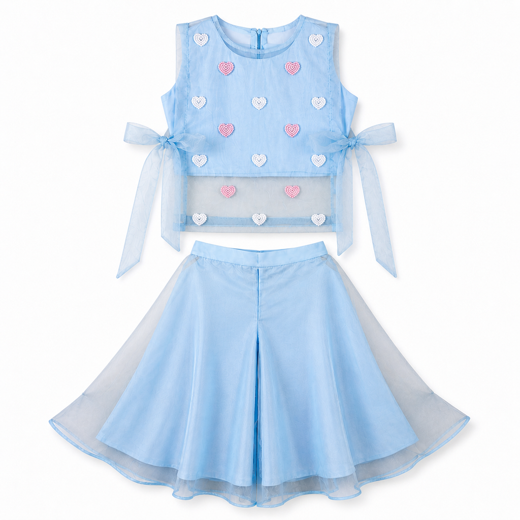 Light blue children's outfit with heart patterns on a white background