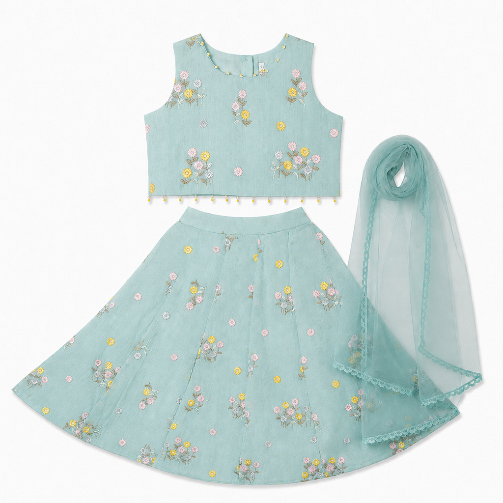 Light blue traditional outfit with floral patterns on a white background