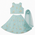 Light blue traditional outfit with floral patterns on a white background