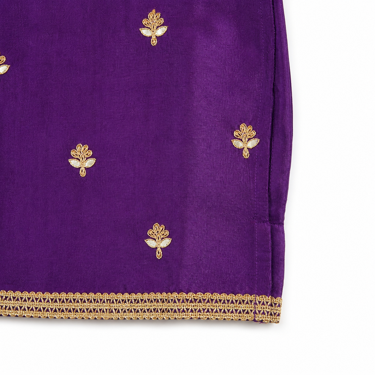 Purple fabric with gold embroidery on a white background
