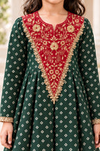 Red-maroon front panel with gold floral embroidery, decorative edging and notched neckline
