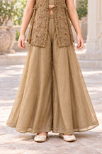 Champagne gold shimmer crush palazzo trousers showing two flared legs and narrow hems