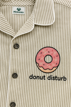 Close-up of donut motif and contrast piping on striped night suit