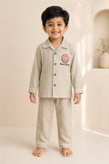 Boy wearing Donut Disturb striped kids night suit, front view
