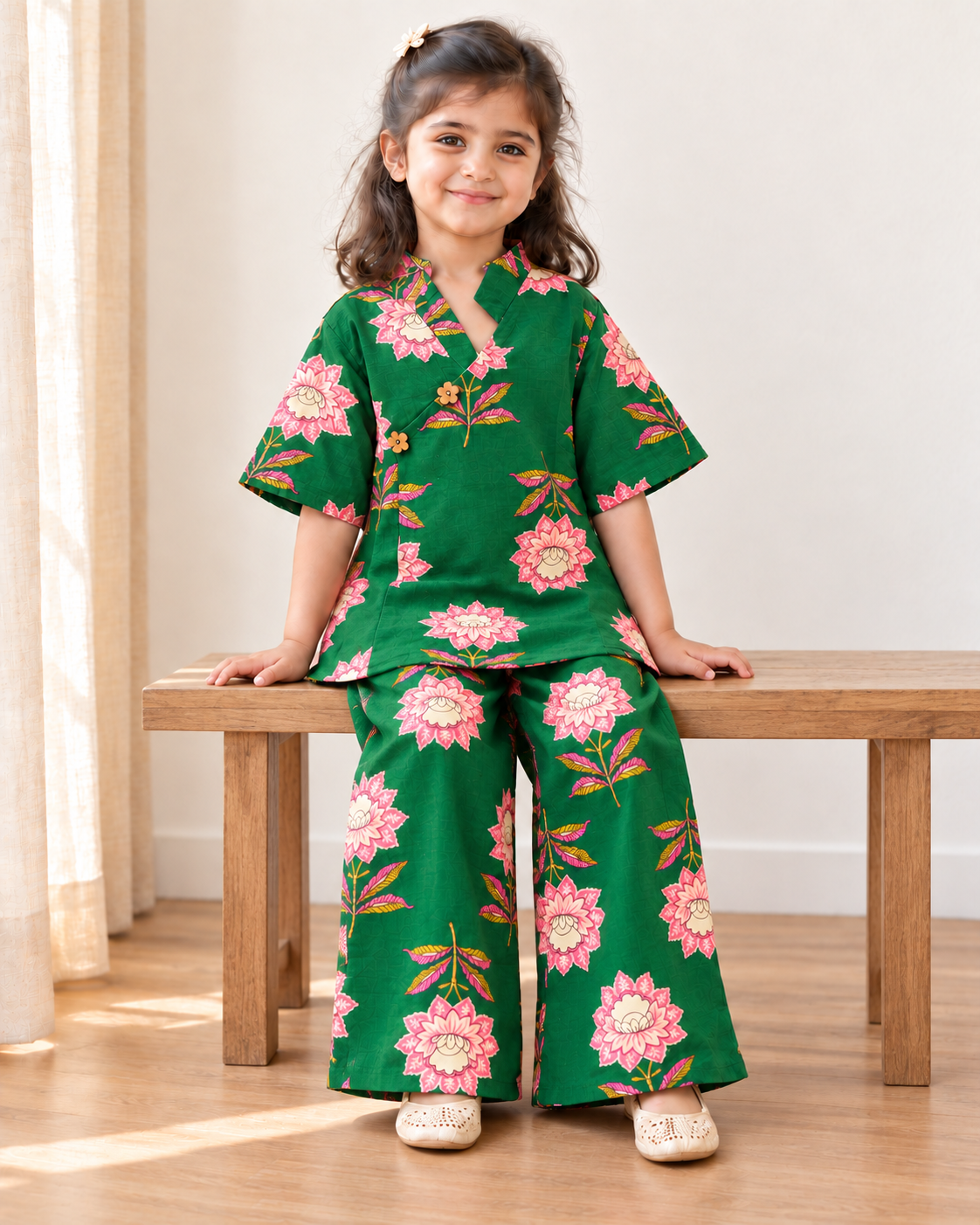 Emerald Green Floral Angrakha Palazzo Set for Girls — seated lifestyle view