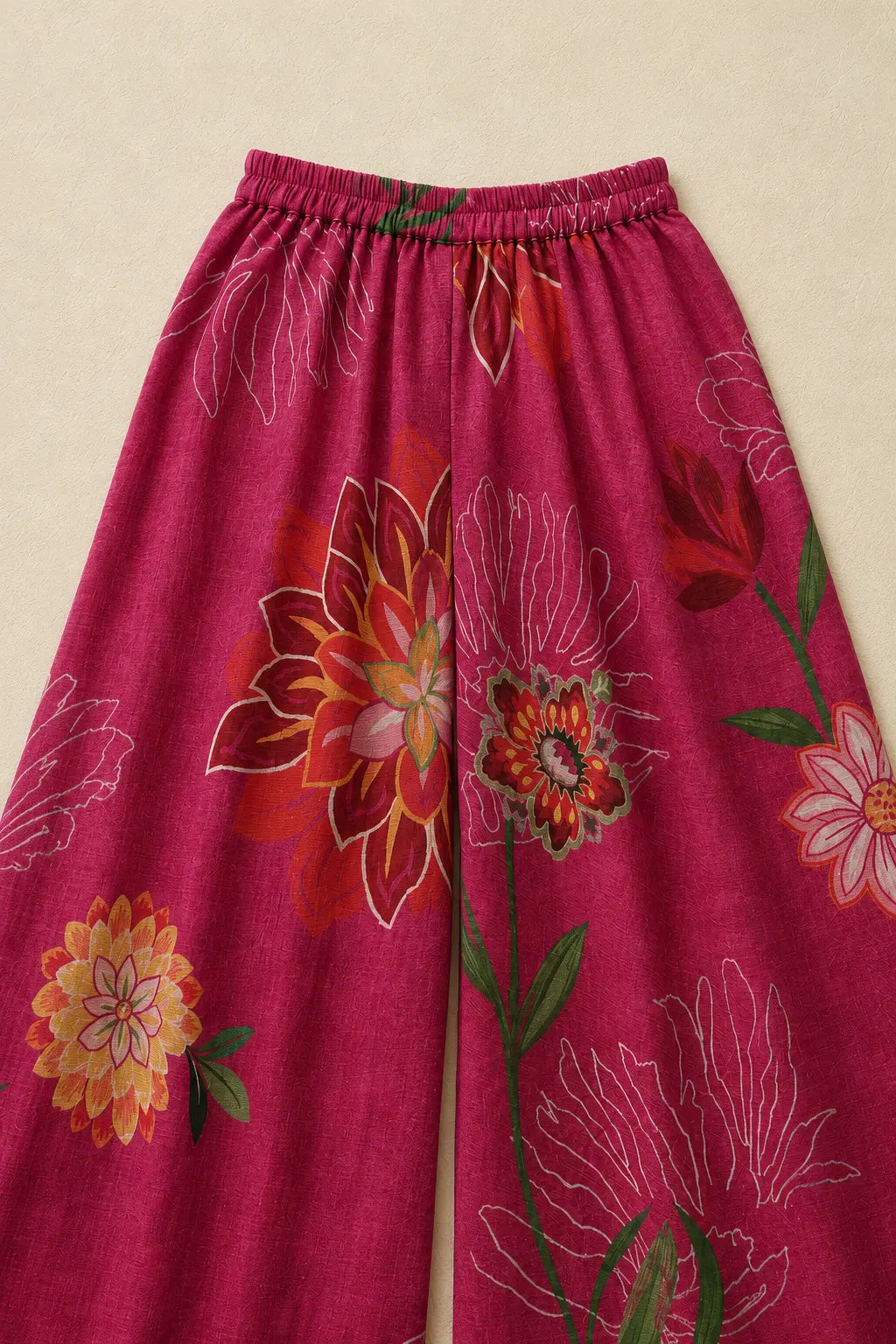 Close-up of fuchsia pink floral print on the palazzo fabric