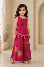 Girl in fuchsia pink floral palazzo set, alternate front view