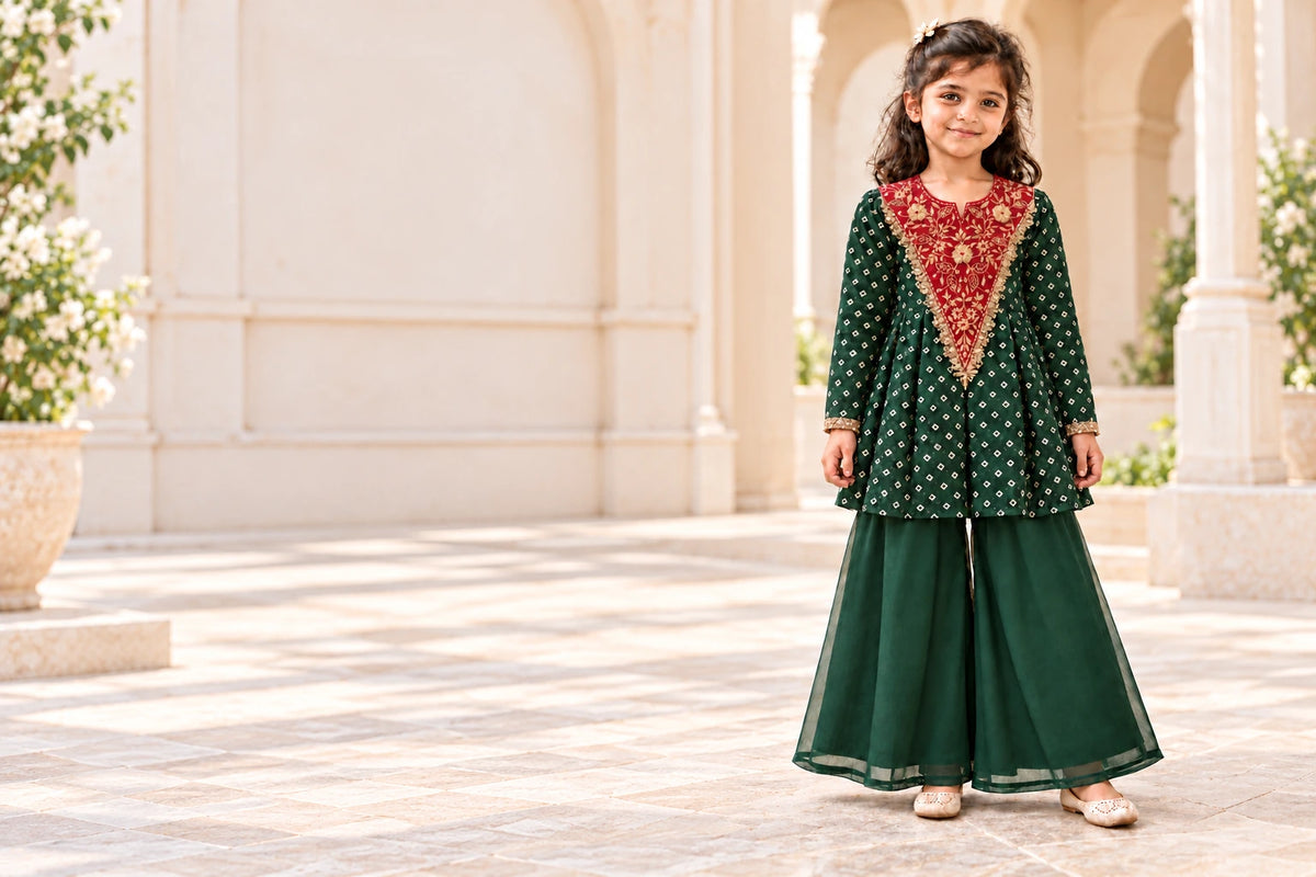 Girl wearing the bottle green chinon peplum and organza palazzo set