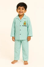 Boy wearing mint gingham Avocuddle kids night suit, front view