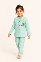 Boy walking in mint gingham Avocuddle night suit