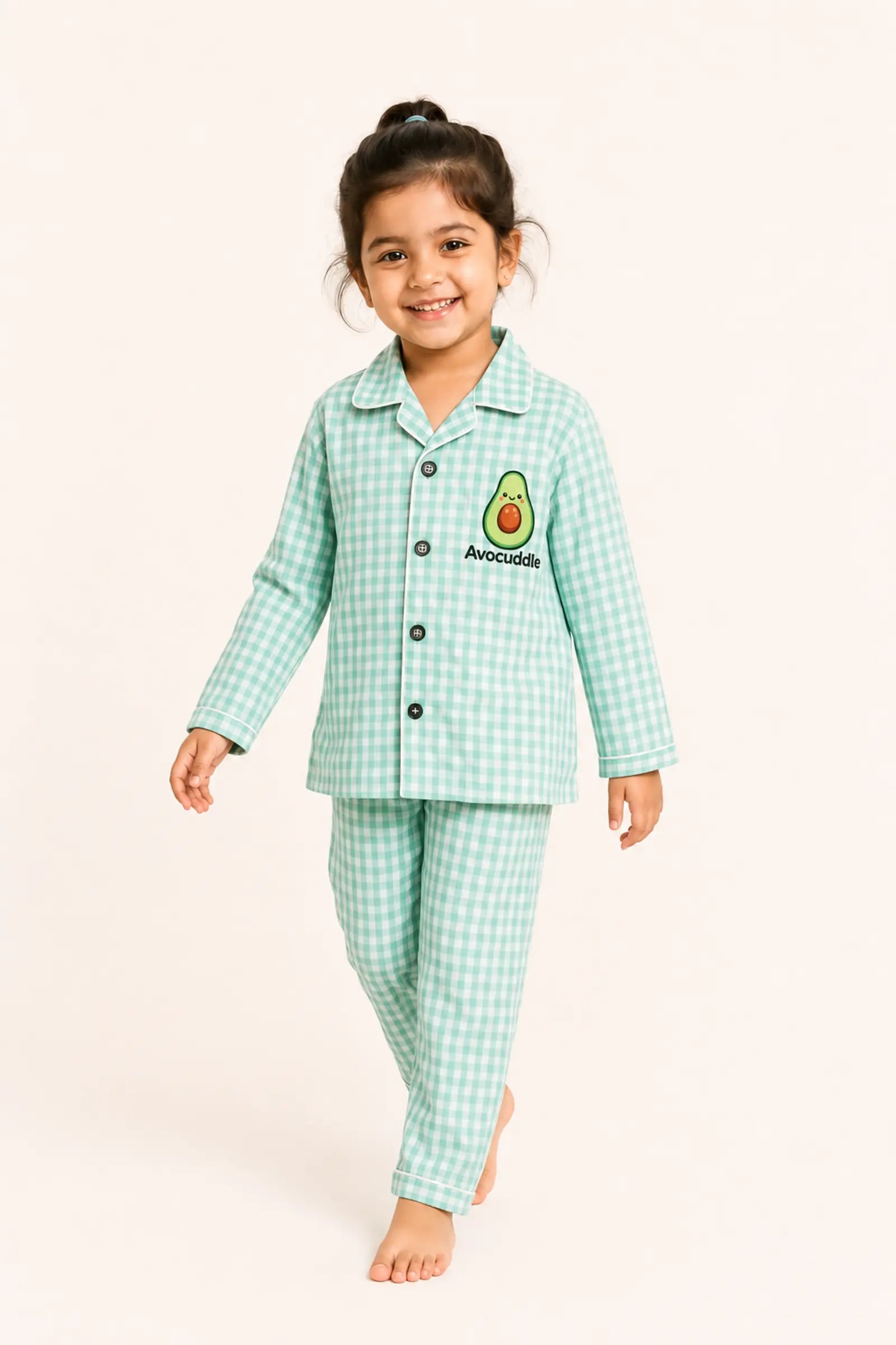 Boy walking in mint gingham Avocuddle night suit