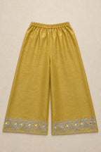 Mustard soft silk flared pants with embellished hem