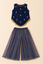 Navy blue pointed-hem top and dusty navy tissue sharara laid flat