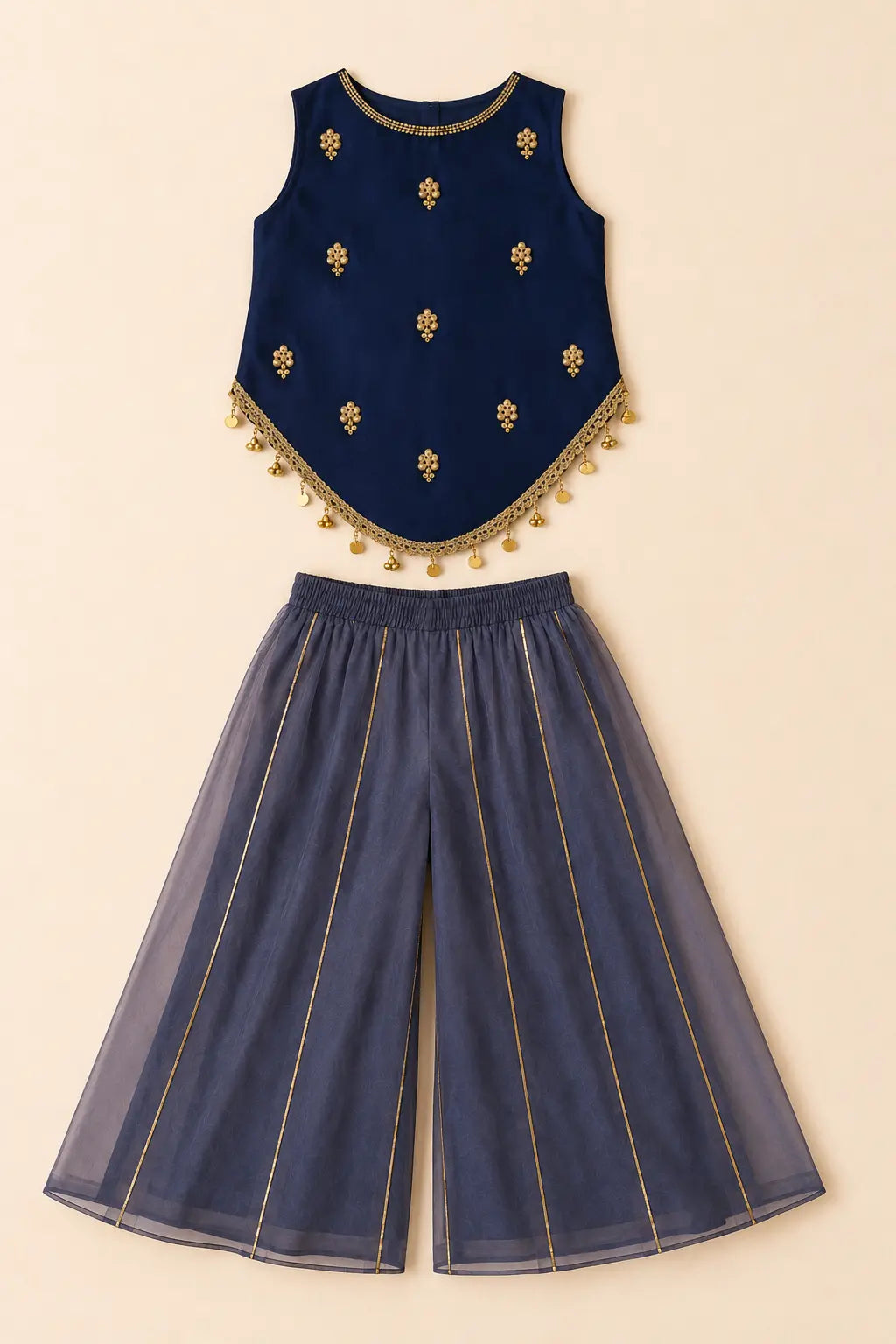 Navy blue pointed-hem top and dusty navy tissue sharara laid flat