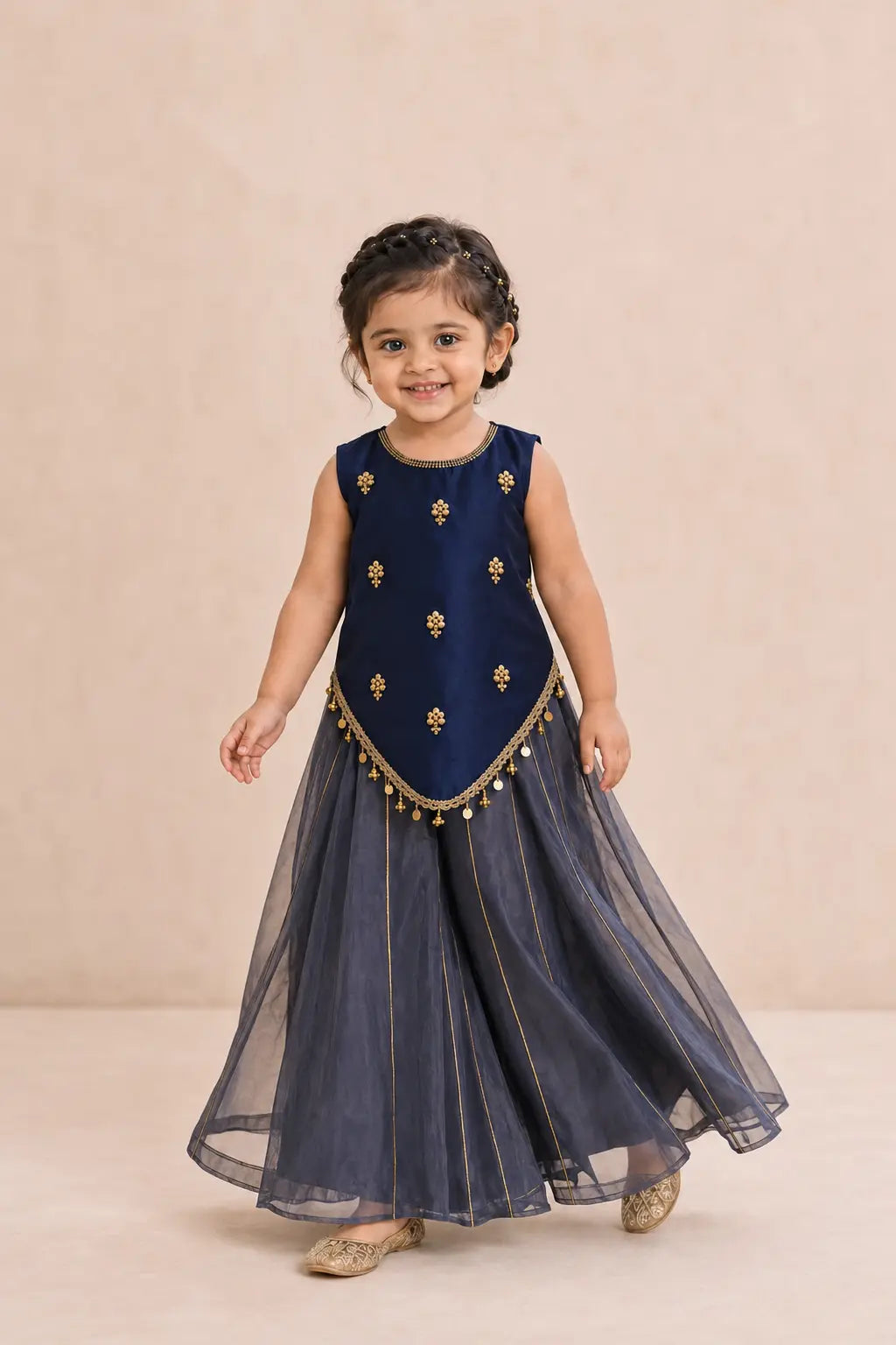 Girl walking in navy blue Indo-Western top and dusty navy sharara, movement view