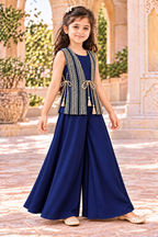 Angled view of the navy three-piece outfit showing the geometric lace jacket and side tie-up