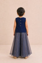 Back view of girl in navy blue top and dusty navy sharara