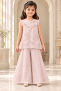 Girl wearing nude pink mulmul pita work top and palazzo set, front view