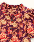 Plum Floral Puff-Sleeve Palazzo Set for Girls — floral fabric and button close-up