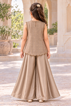 Back of the taupe gold top with small gold butti motifs, neckline opening and scalloped hem